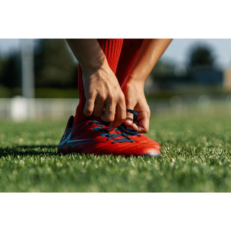 Kinder Rugby Schuhe R500 FG gegossene Sohle trockener Untergrun rot