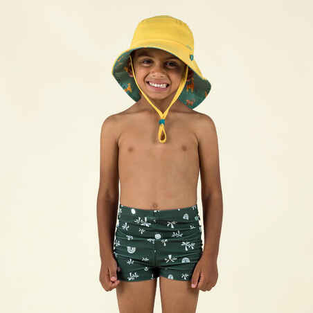 Beebide / laste ujumispüksid, päikesemustriga, tumerohelised