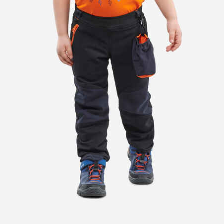 Črne pohodniške softshell hlače MH550 za otroke od 2 do 6 let