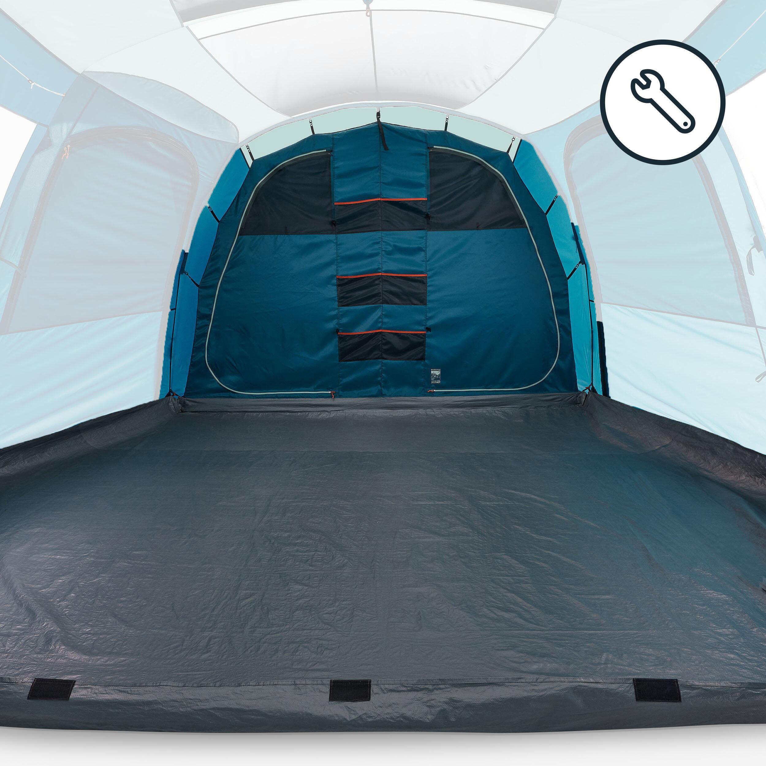 Changing rooms and floor mats in a rigid family tent.