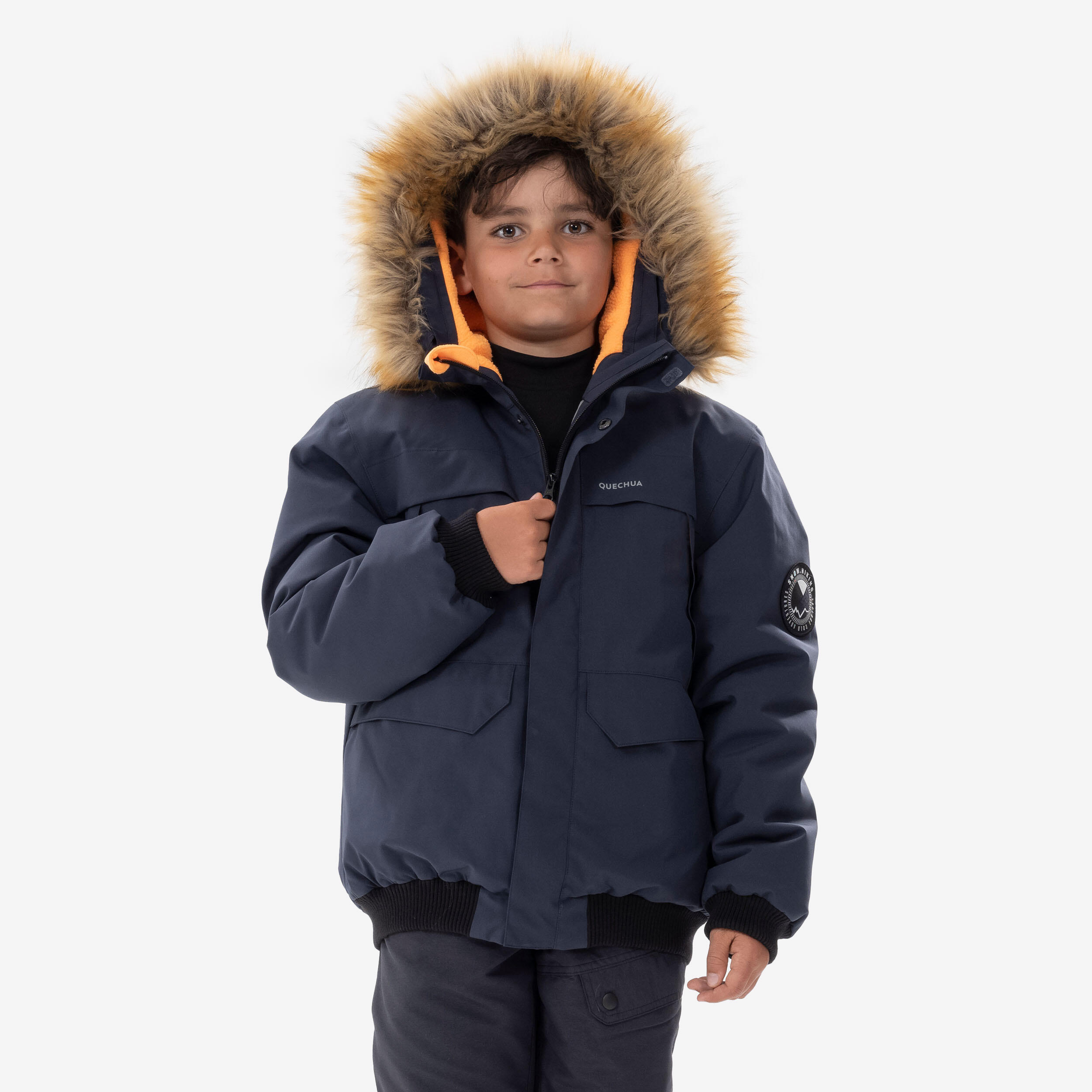 KIDS’ WARM AND WATERPROOF HIKING JACKET - SH100 -6.5°C - 7-15 YEARS 1/14