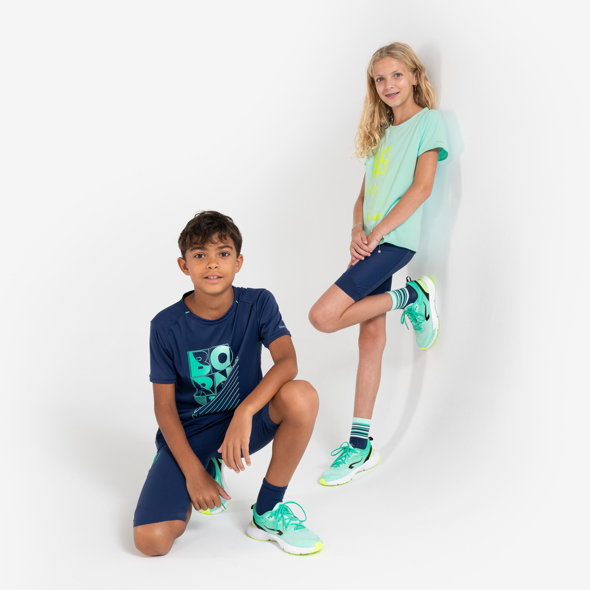 Kids' KIPRUN dry+ running shorts - navy blue and green 15/17