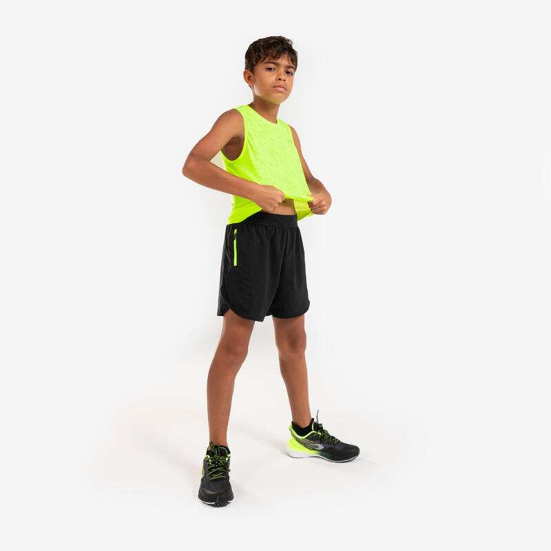 Ademende hardloopshort voor kinderen DRY+ 900 zwart/fluogeel