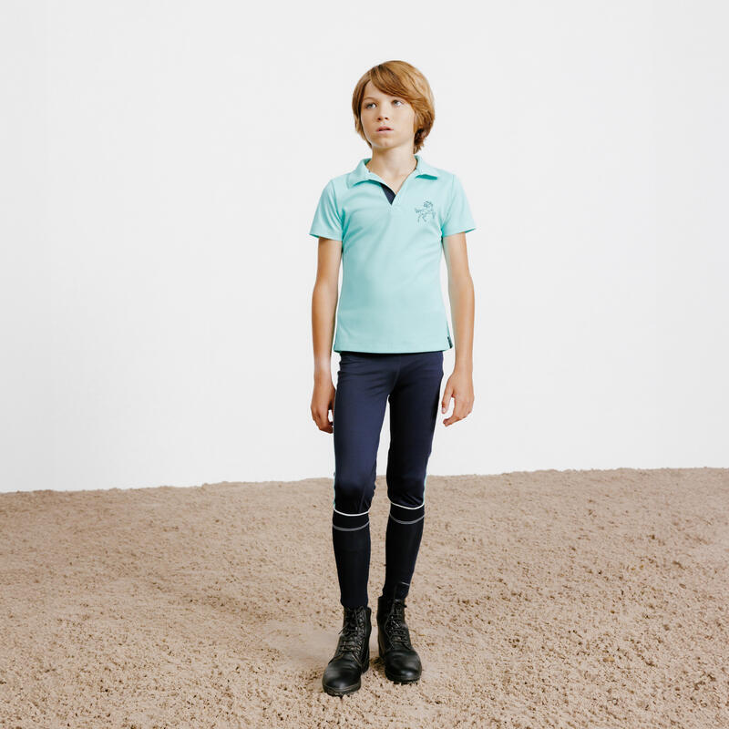 Licht poloshirt voor paardrijden kinderen 500 korte mouwen mesh turquoise