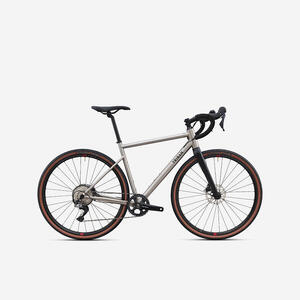Bicicleta de gravel cuadro titanio Shimano GRX ruedas fulcrum Triban GRVL 900 TI