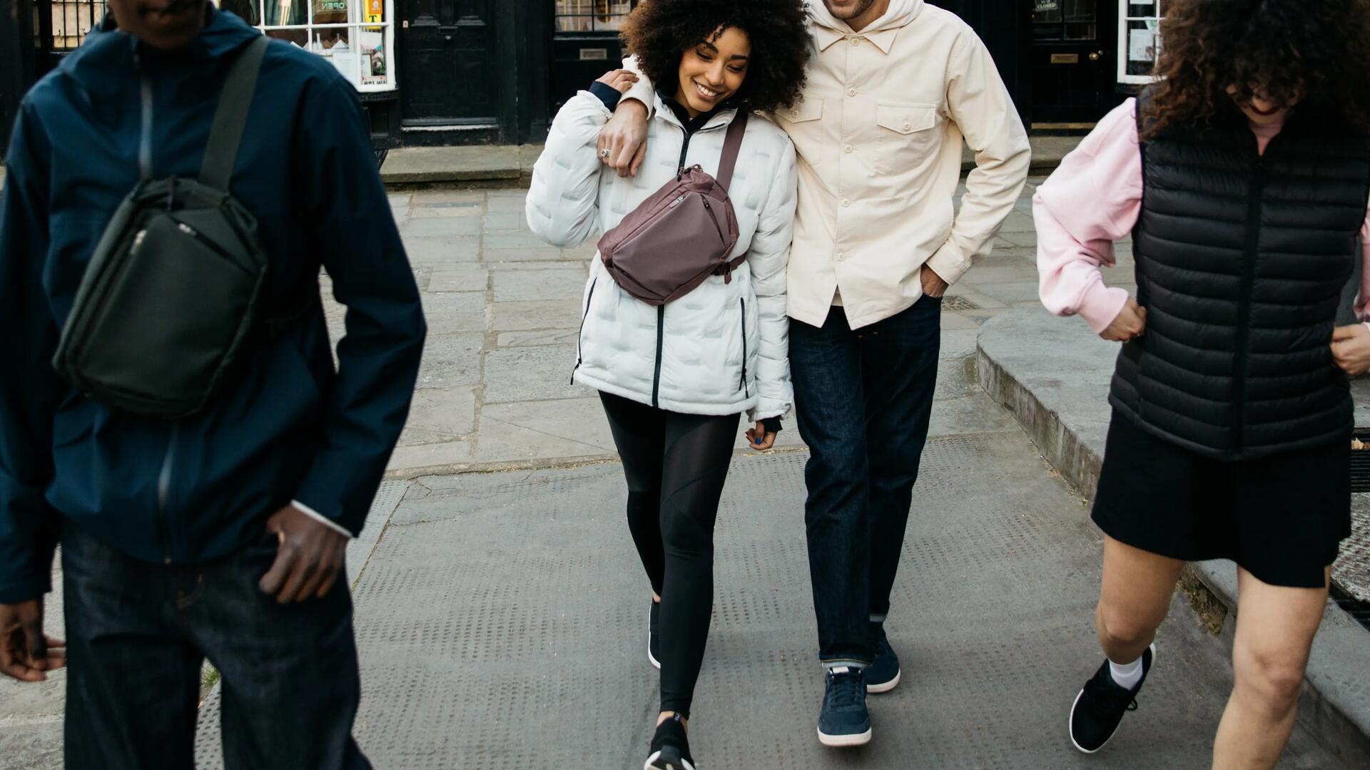 A group of young adults walking in town