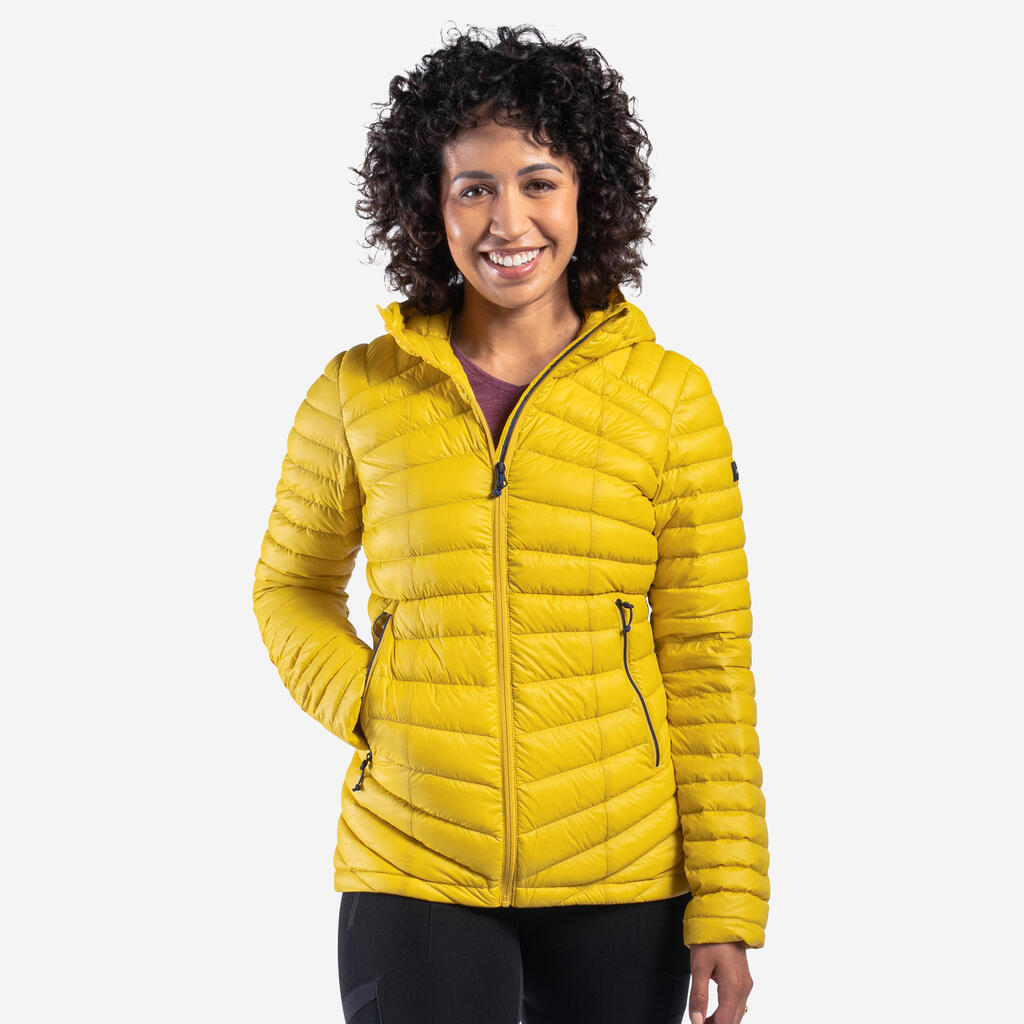 Sieviešu kalnu trekinga dūnu jaka ar kapuci “MT100”, līdz -5 °C