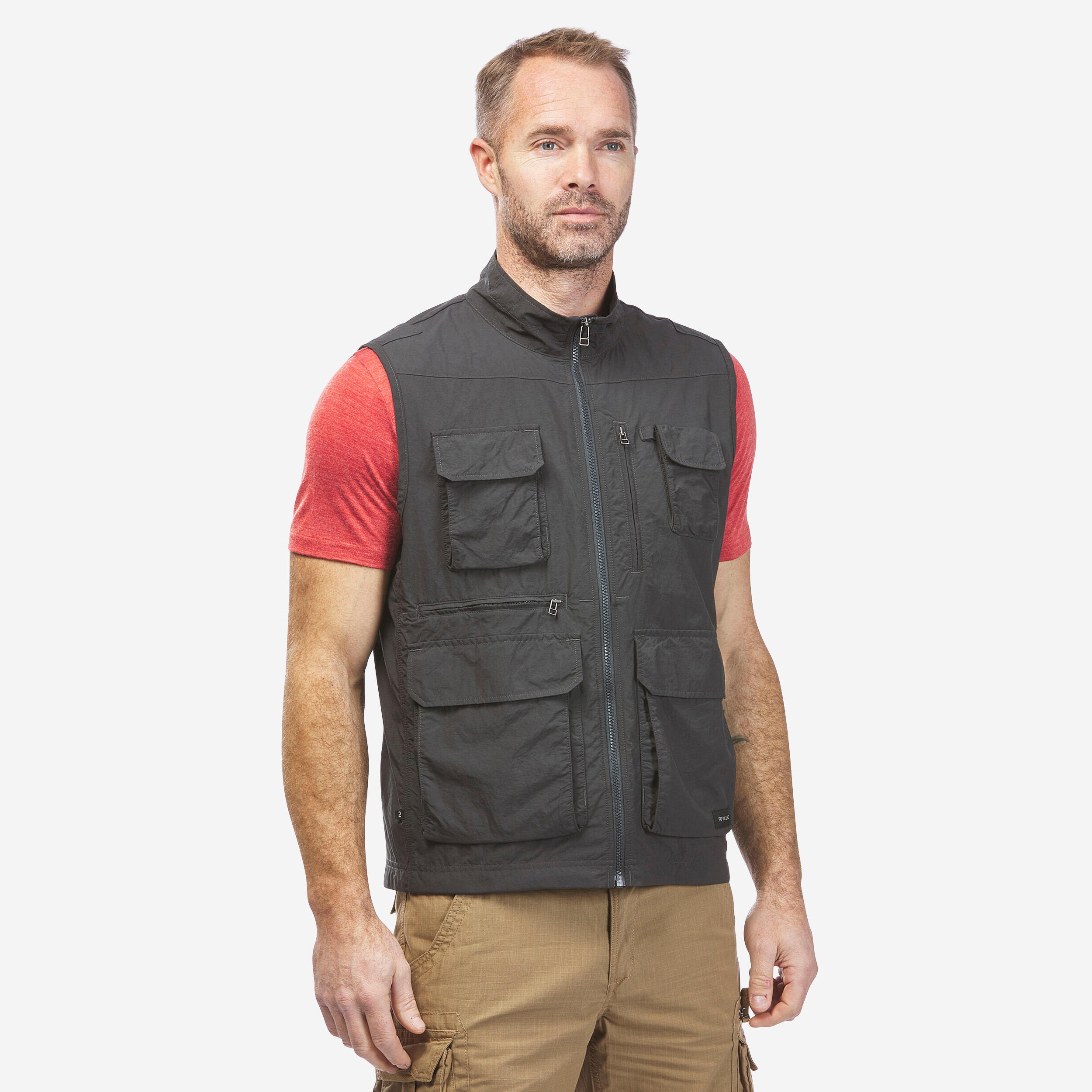 CHAQUETA SIN MANGAS CON MULTIPLES BOLSILLOS DE SENDERISMO HOMBRE TRAVEL 100 GRIS Decathlon