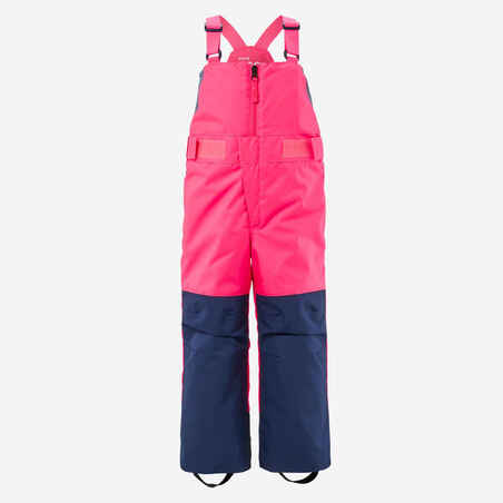 KIDS’ WARM AND WATERPROOF SKI DUNGAREES - 500 PNF - NEON PINK AND NAVY 