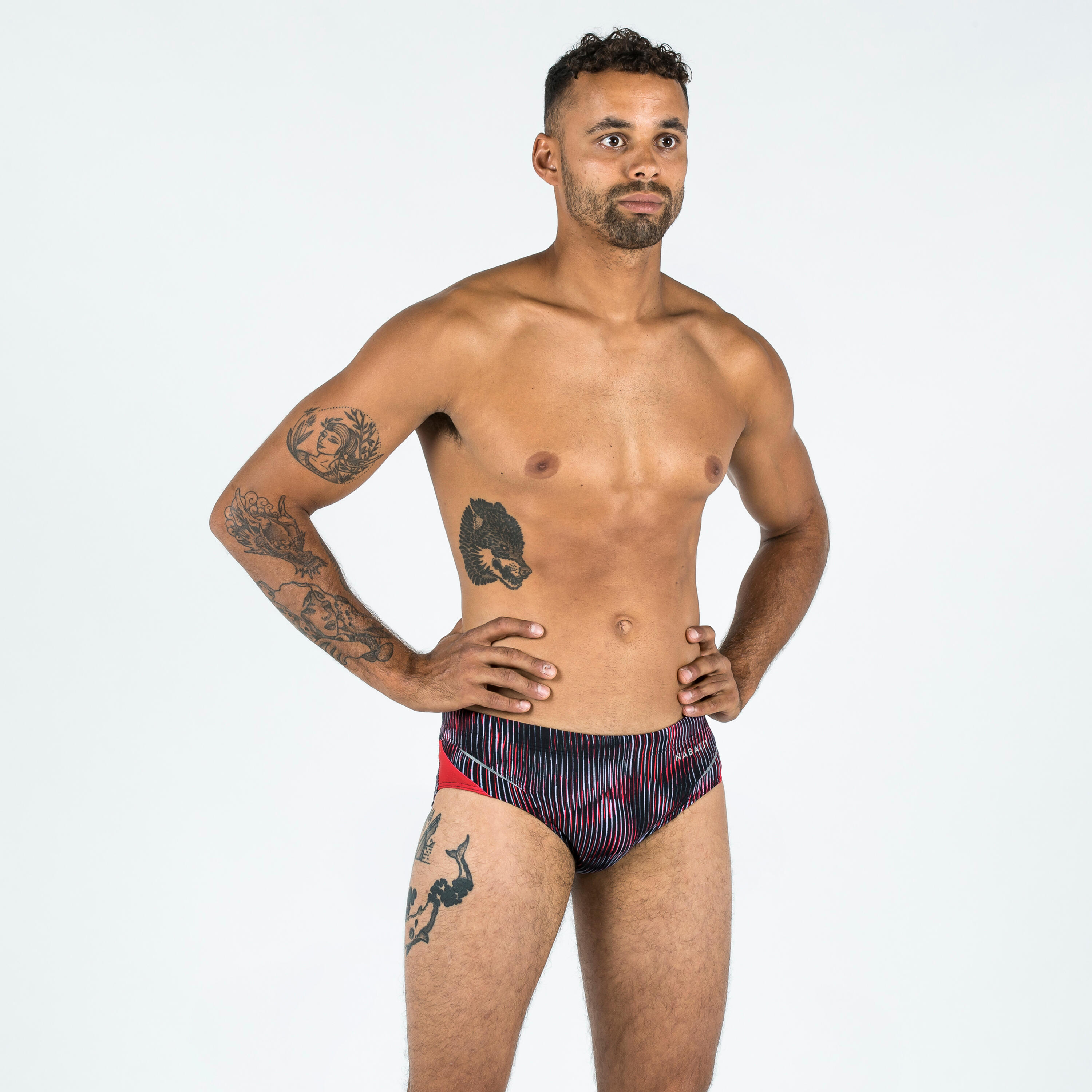 MAILLOT DE BAIN NATATION HOMME  SLIP 900 PRINT ALL GRAN ROUGE 7/10