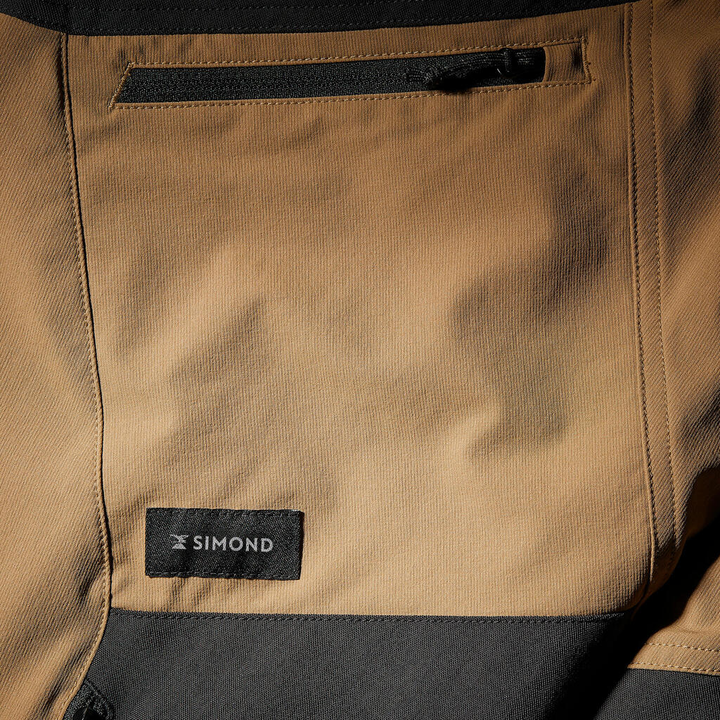 Pantalón de trekking en montaña perlante y rompevientos para hombre MT900