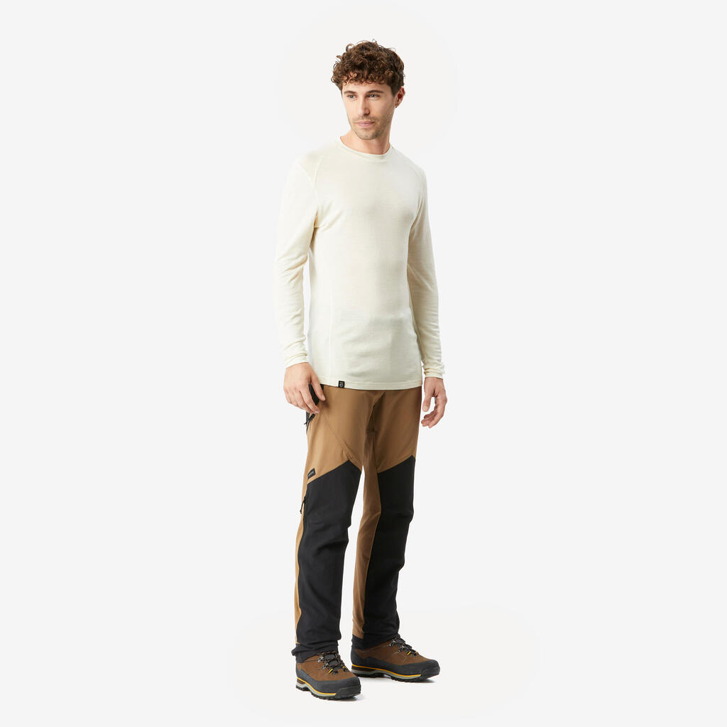 Pantalón de trekking en montaña perlante y rompevientos para hombre MT900