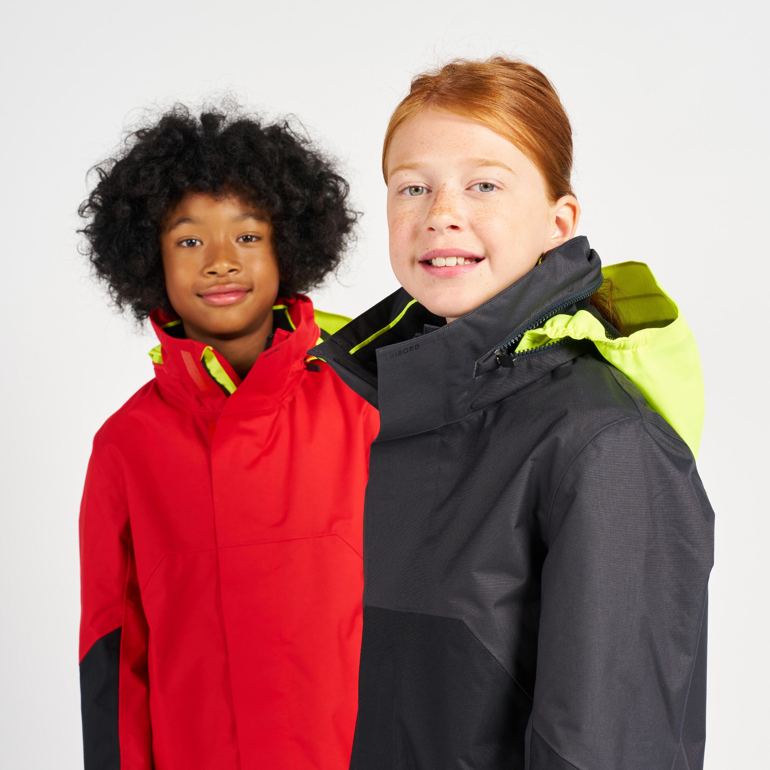 Kids’ waterproof windproof SAILING jacket 500 Red yellow 15/16
