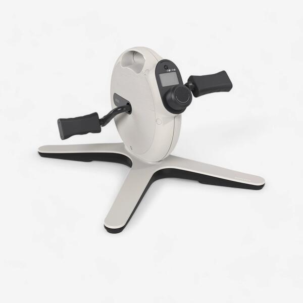 Compact grey and black mini pedal exerciser with foot pedals