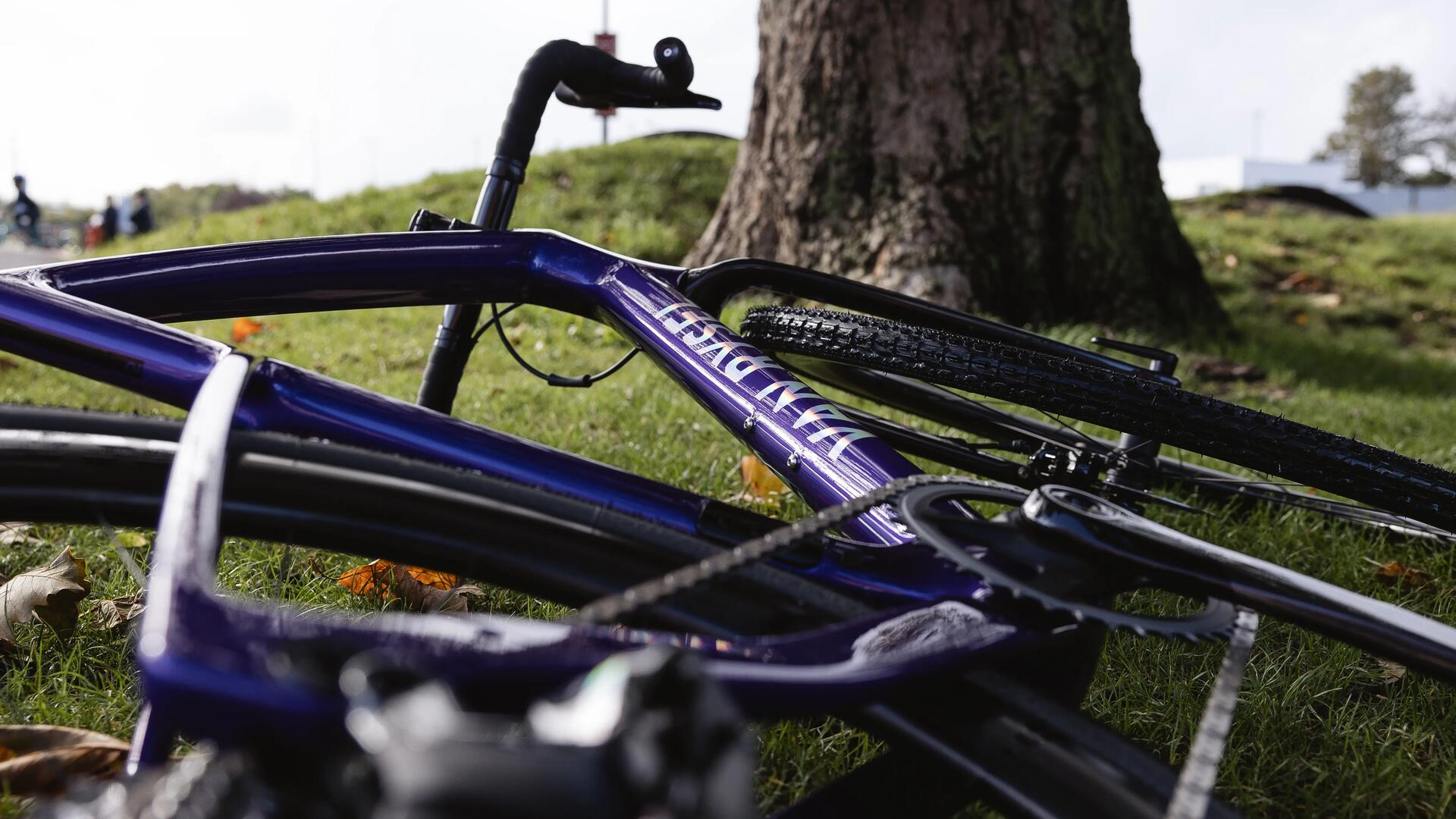 Man checking his tire before his bike ride