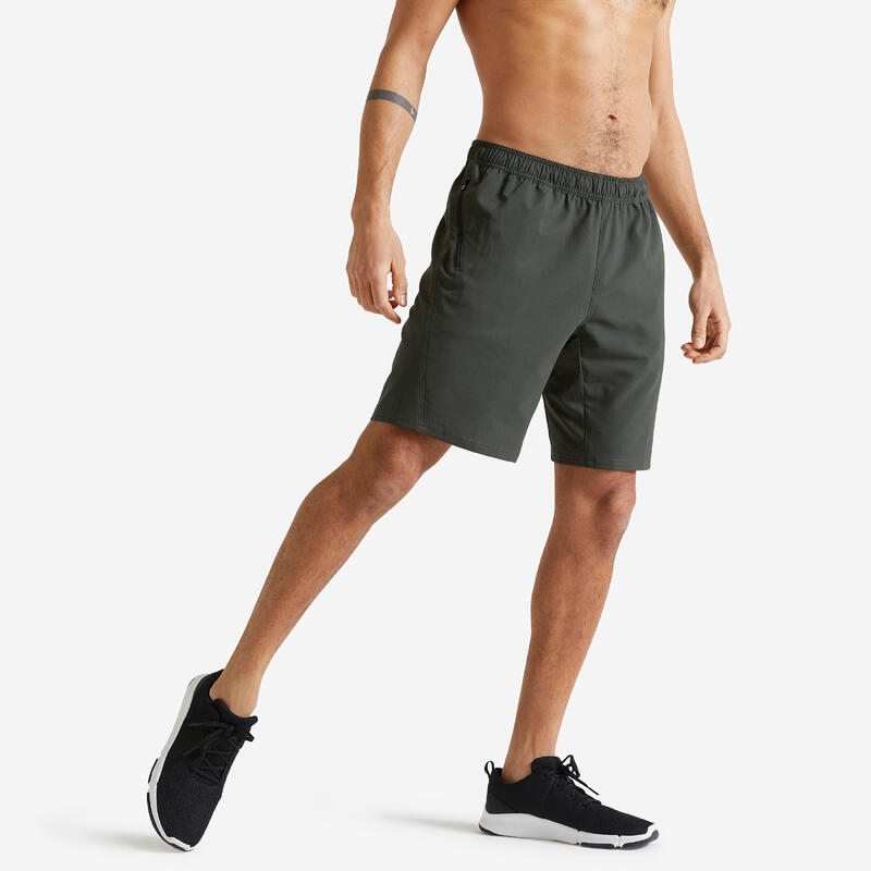 Short de fitness essentiel respirant poches zippés homme - kaki uni
