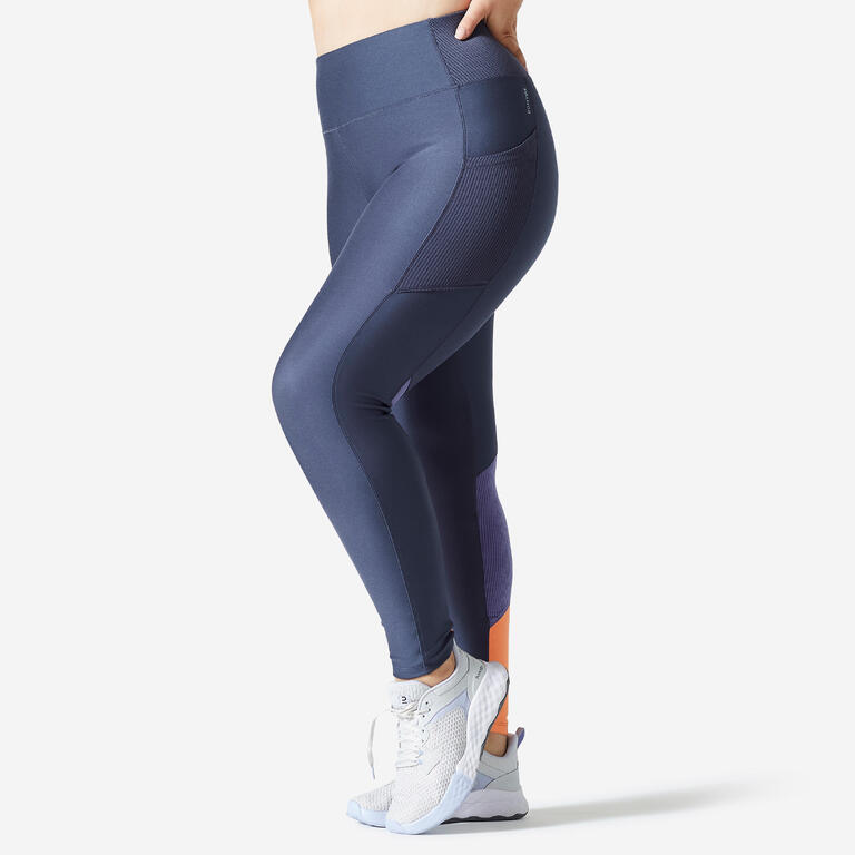 Blue women's cardio fitness leggings with a high-rise waistband, side pocket and orange ankle detail