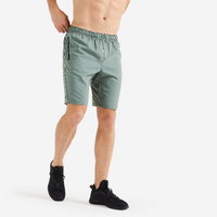 Short de fitness essentiel respirant poches zippés homme - vert uni