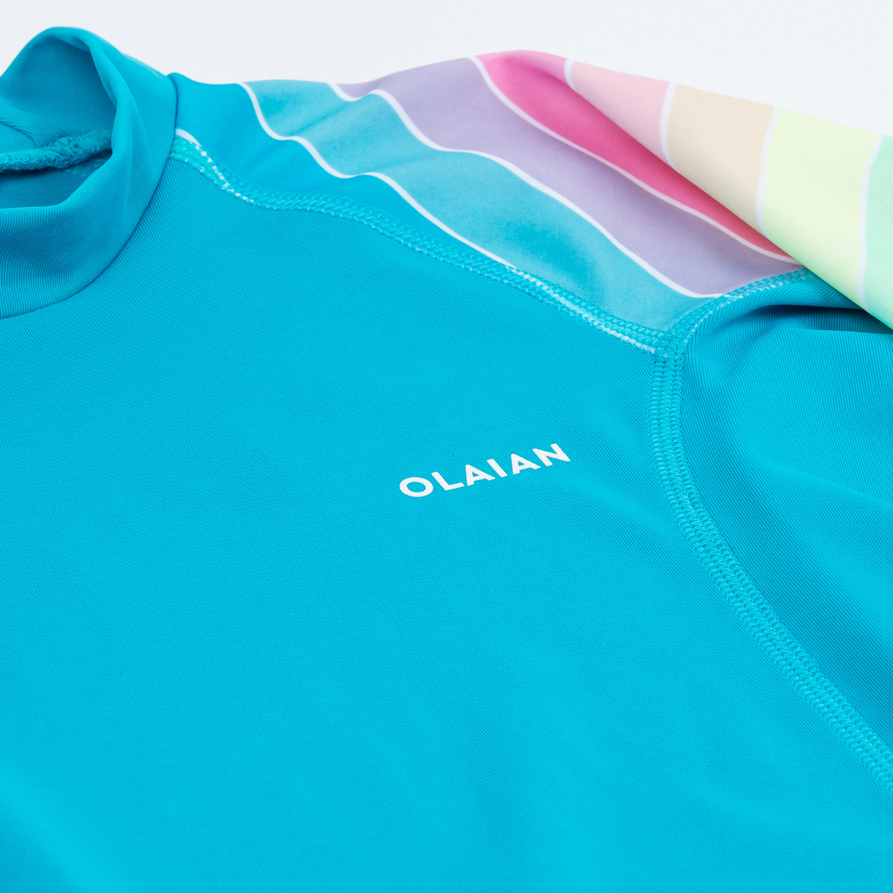 Maglia anti-UV ragazza 500 RAINBOW azzurra 5/6
