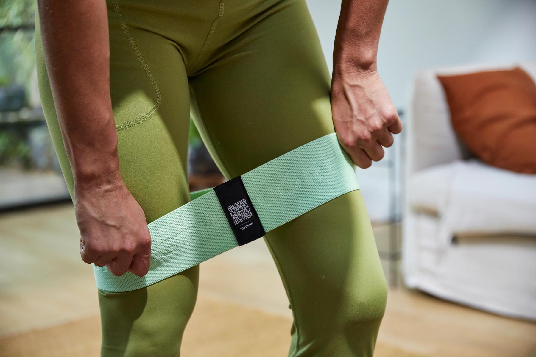 Man stretching with resistance band