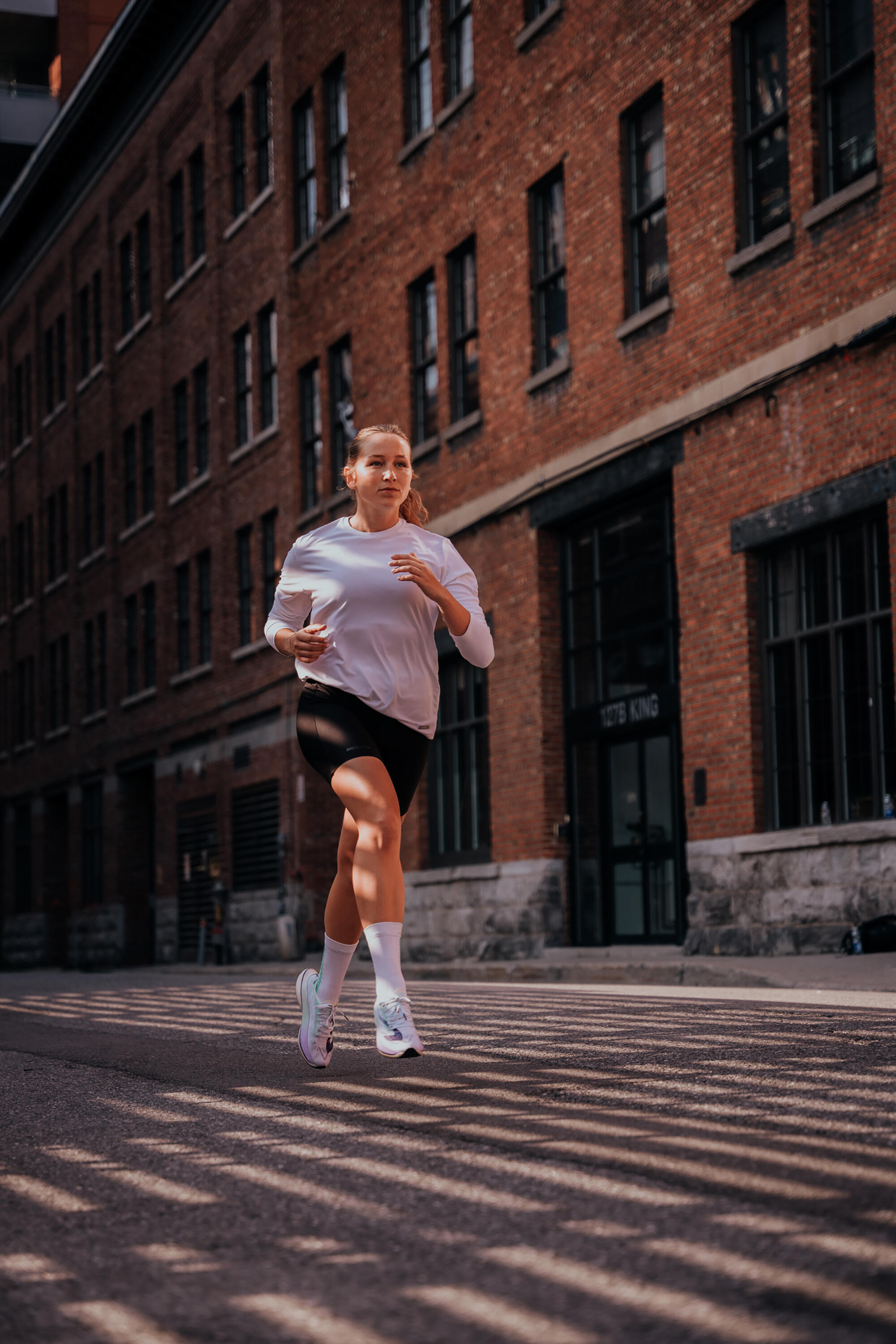 Short cycliste running femme - kiprun run 100 noir 8/10