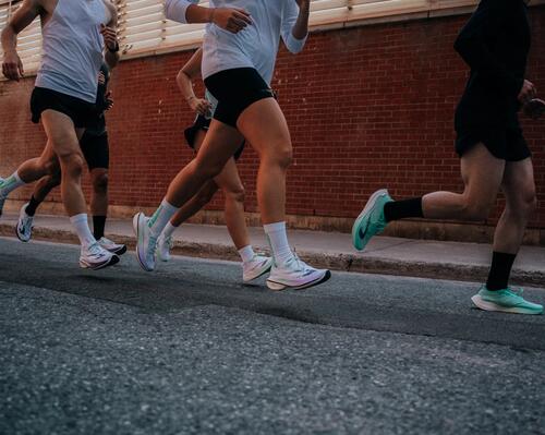 People standing with Running Shoes on