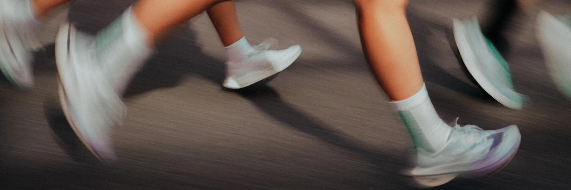 Woman running track