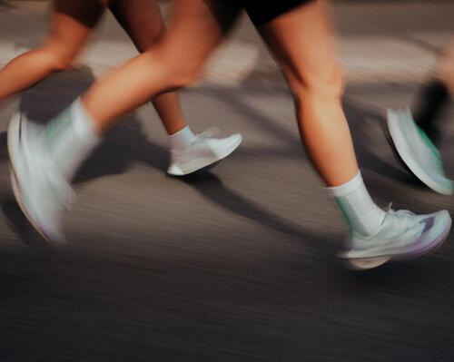 Woman running track