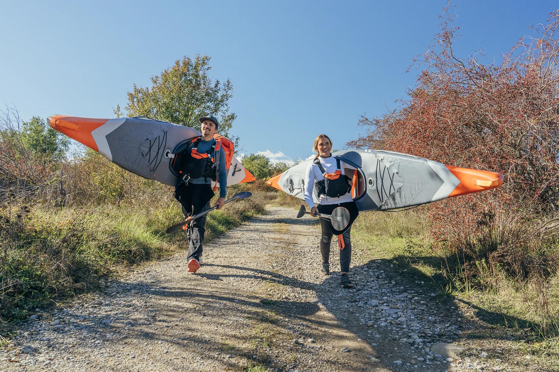 Two people in an inflatable kayak: carry bag and pump included