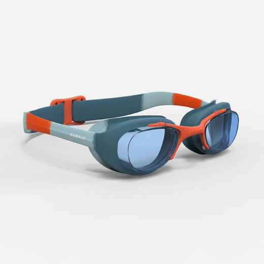 
      Naočale za plivanje Xbase s prozirnim staklima dječje zeleno-narančaste 
  