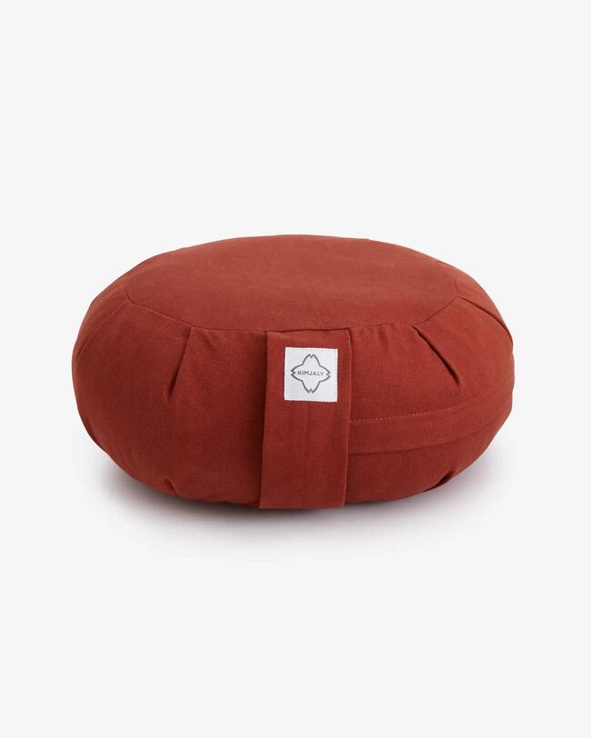Ein rotes Zafu.