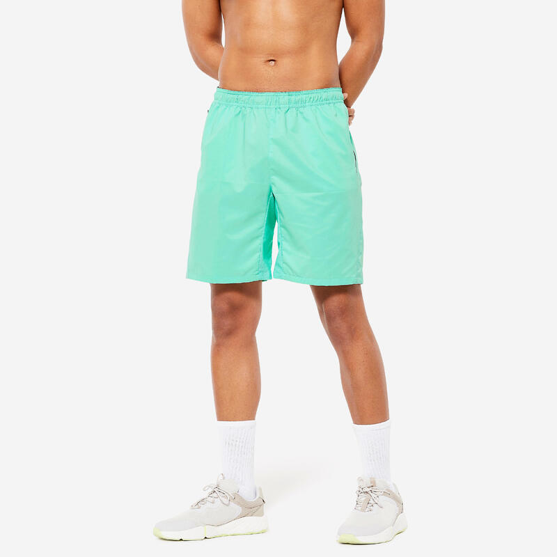 Short de fitness essentiel respirant poches zippés homme - vert