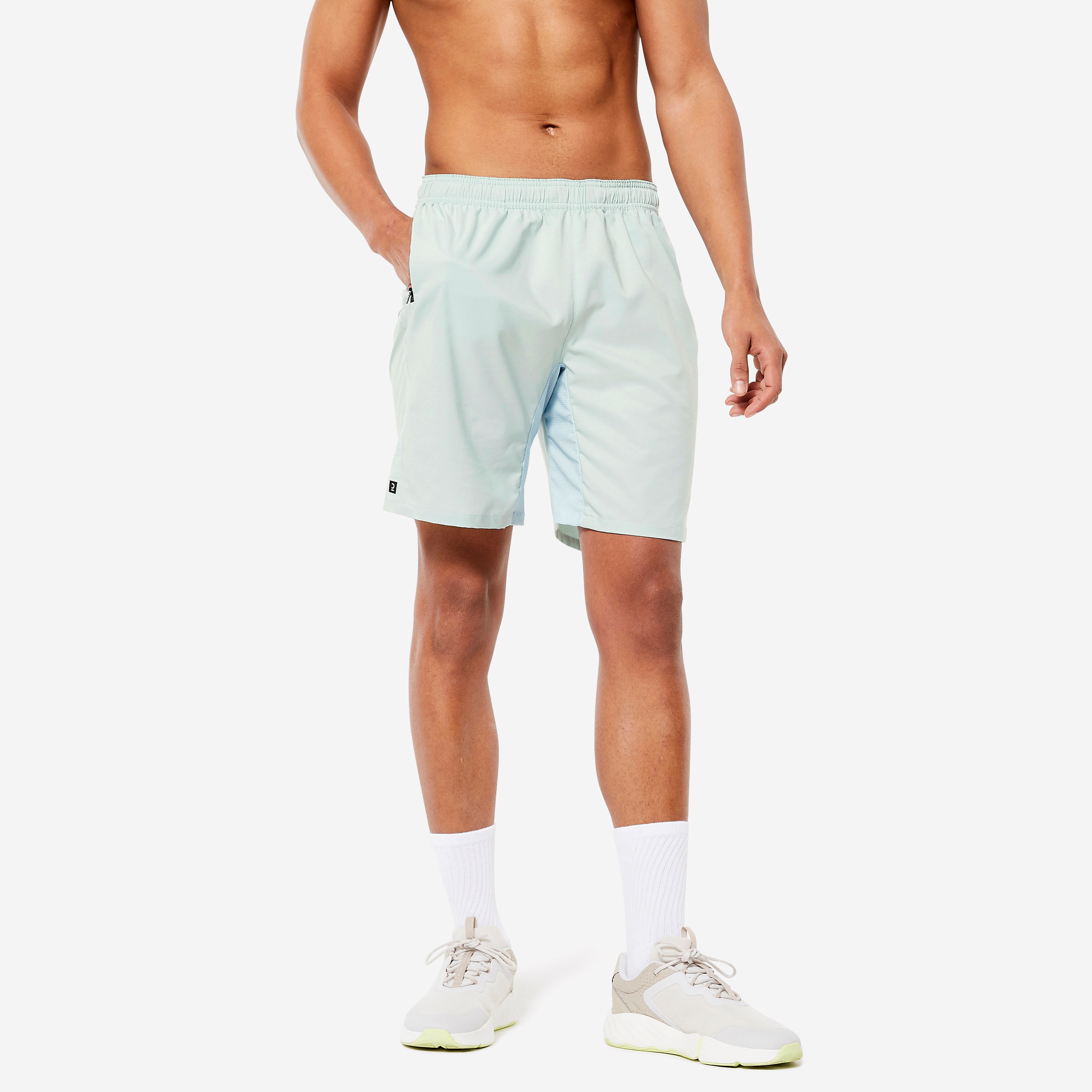 Short de fitness essentiel respirant poches zippés homme - vert