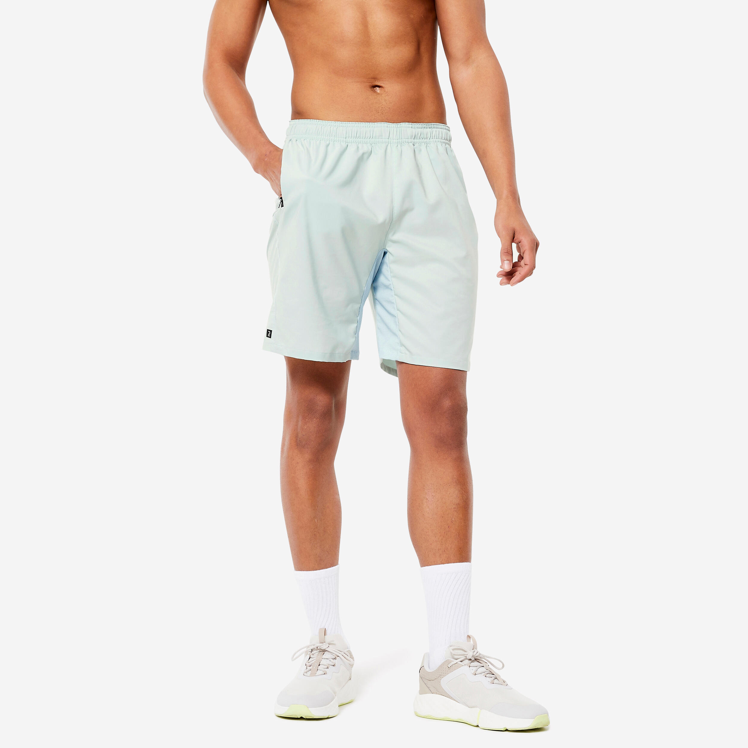 Fitness shorts with zipped pockets, celadon green