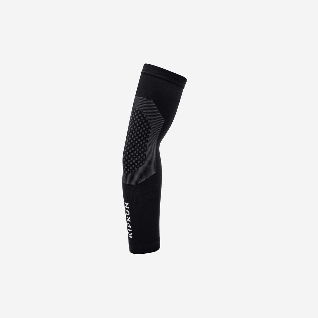 Cubrebrazos de running negros unisex KIPRUN 