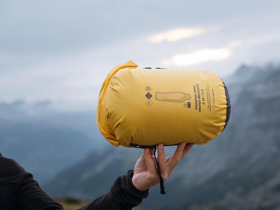 close up of a compact sleeping bag in its bag 