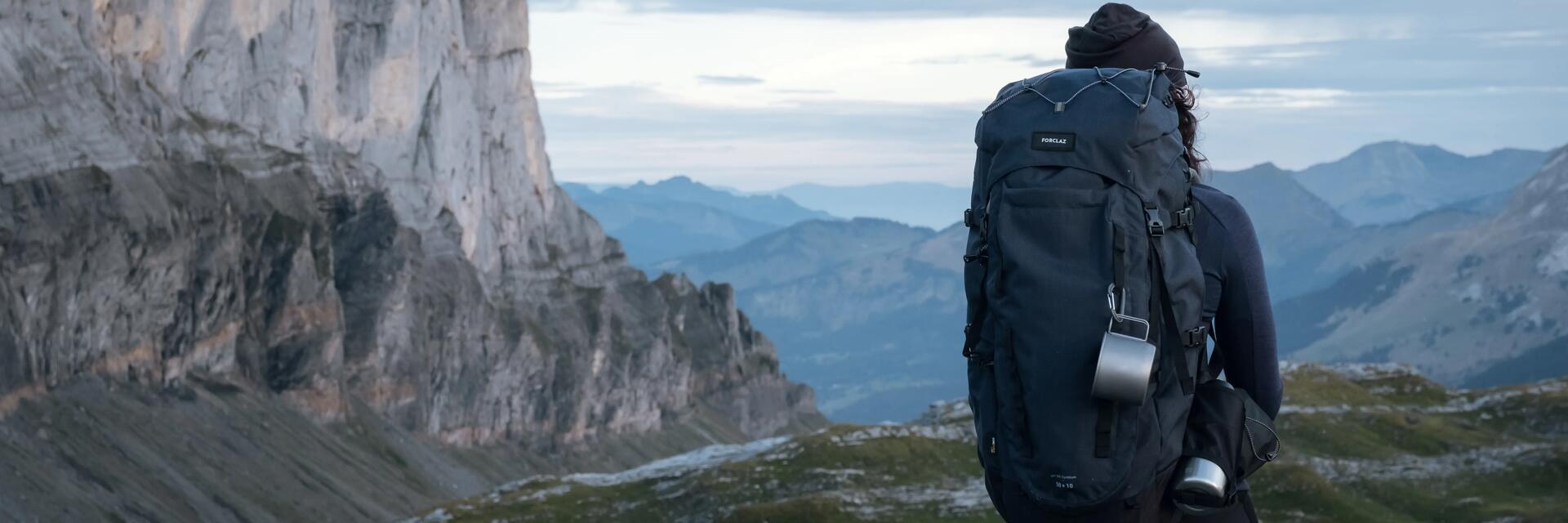 Couple of women hiking with rucksacks