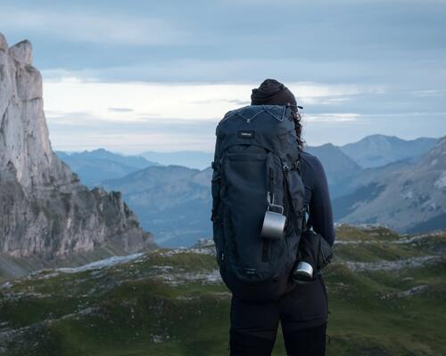 Couple of women hiking with rucksacks