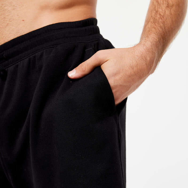 Pantaloncini uomo palestra 500 regular fit felpati con tasche neri