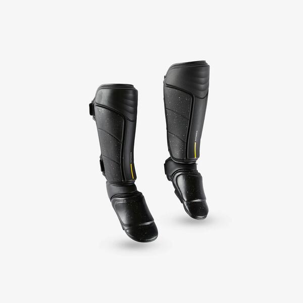 Black padded shin guard with a built-in foot cover