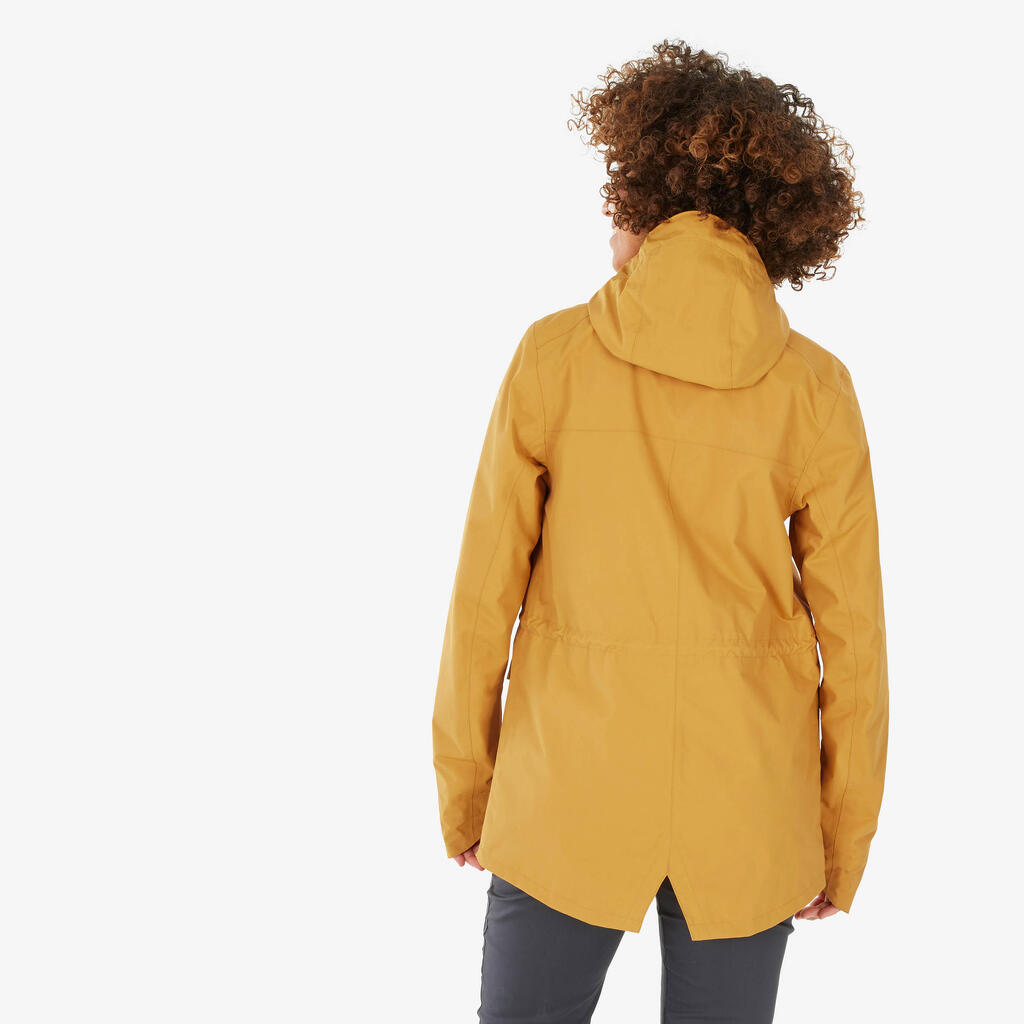 Chaqueta impermeable tipo gaban para senderismo Mujer NH550 Quechua amarillo