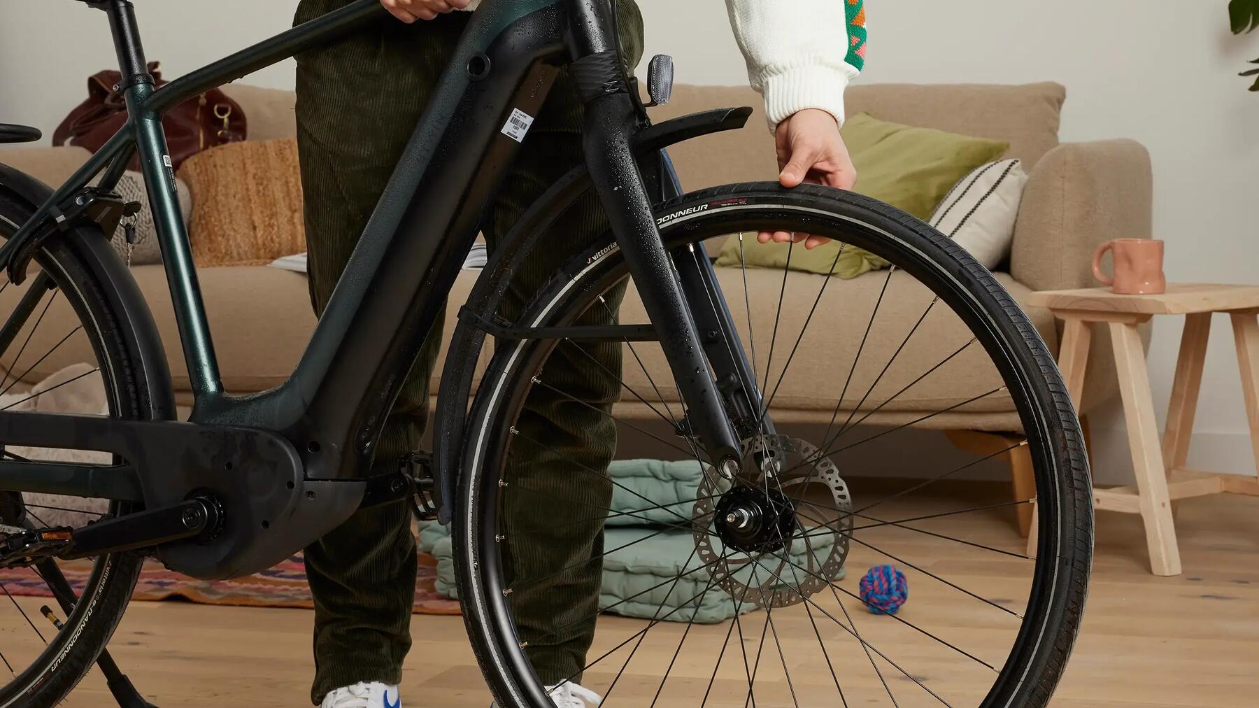 Man changing a bike tyre