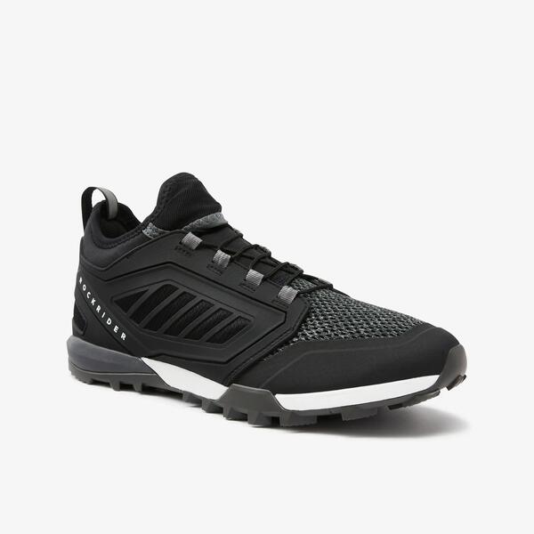 Black mountain bike shoe with a grippy rubber sole