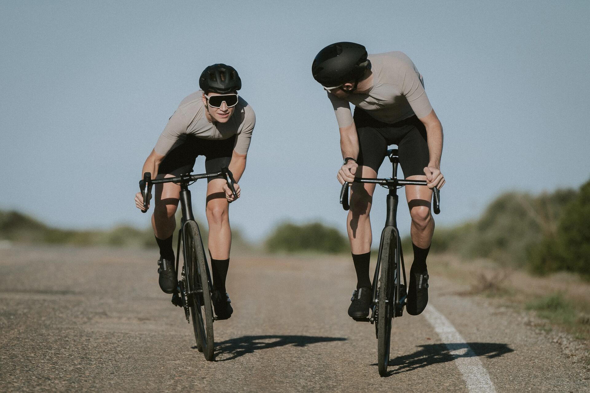Two cyclists riding Van Rysel bikes