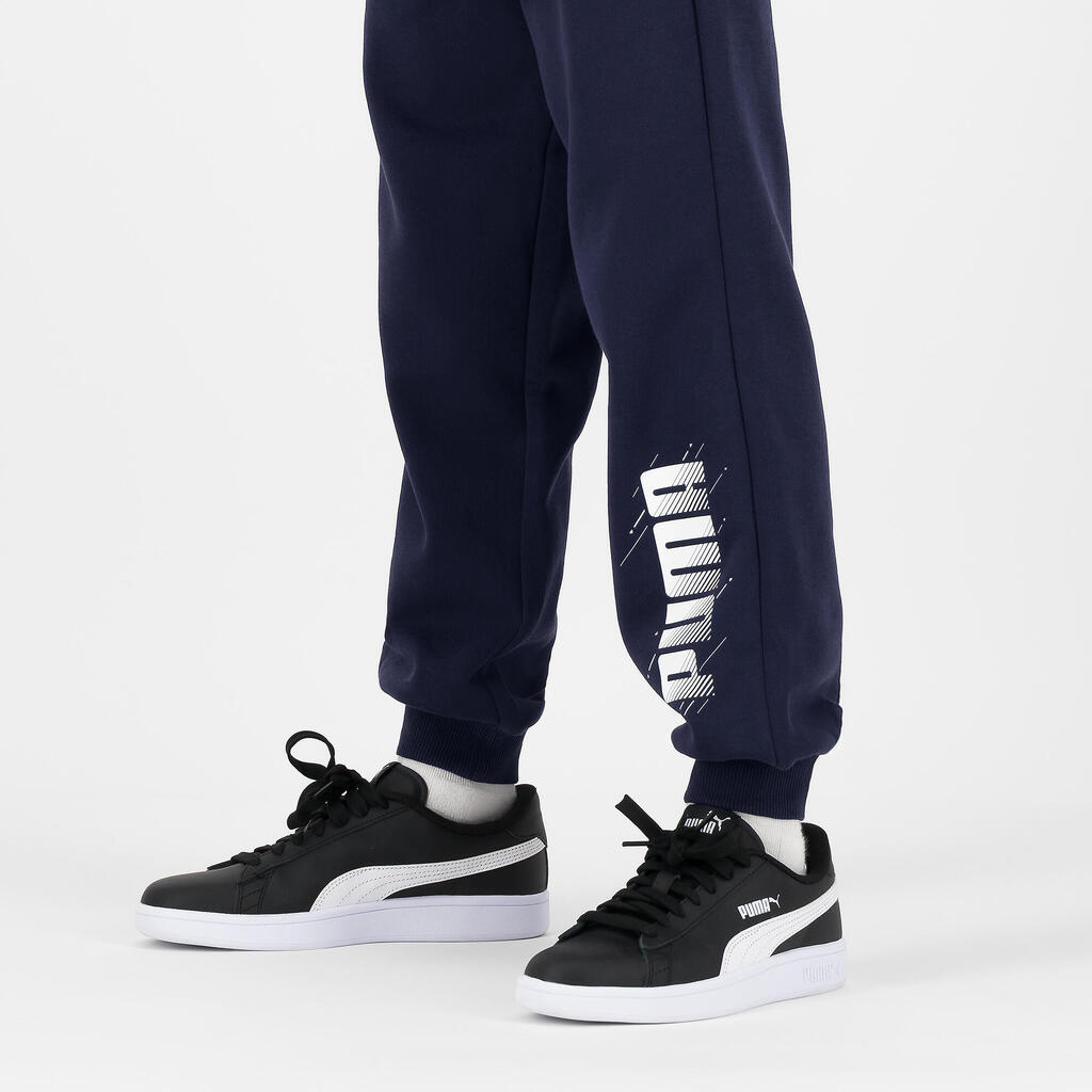 Detské joggingové nohavice Puma námornícka modrá s nápisom