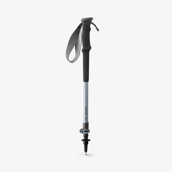 Grey adjustable hiking pole with a foam grip