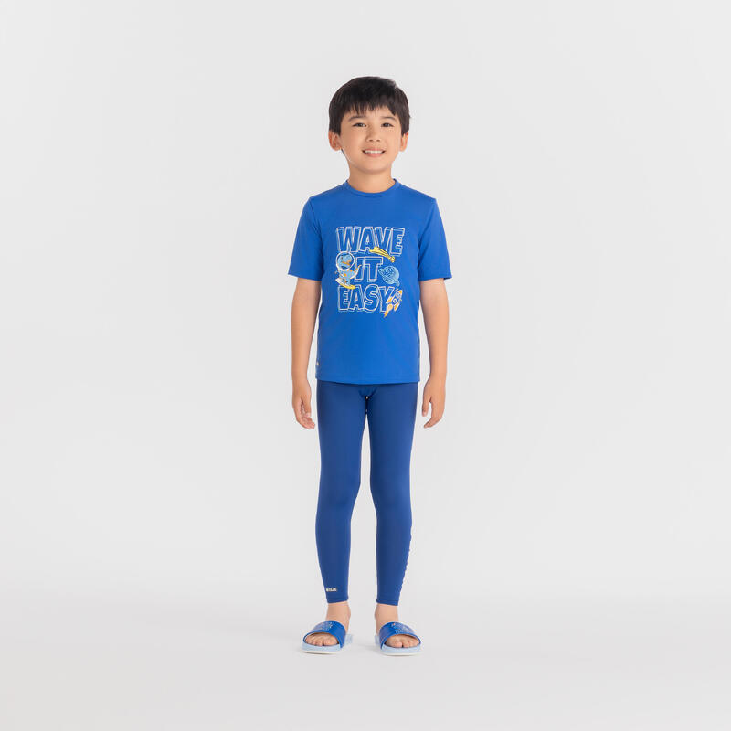 Boys' surfing UV T-shirt - blue dinosaur