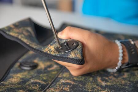 réparer un bouton pression