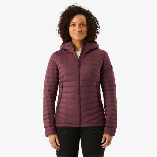 
      Sieviešu kalnu trekinga dūnu jaka ar kapuci “MT100”, līdz -5 °C
  