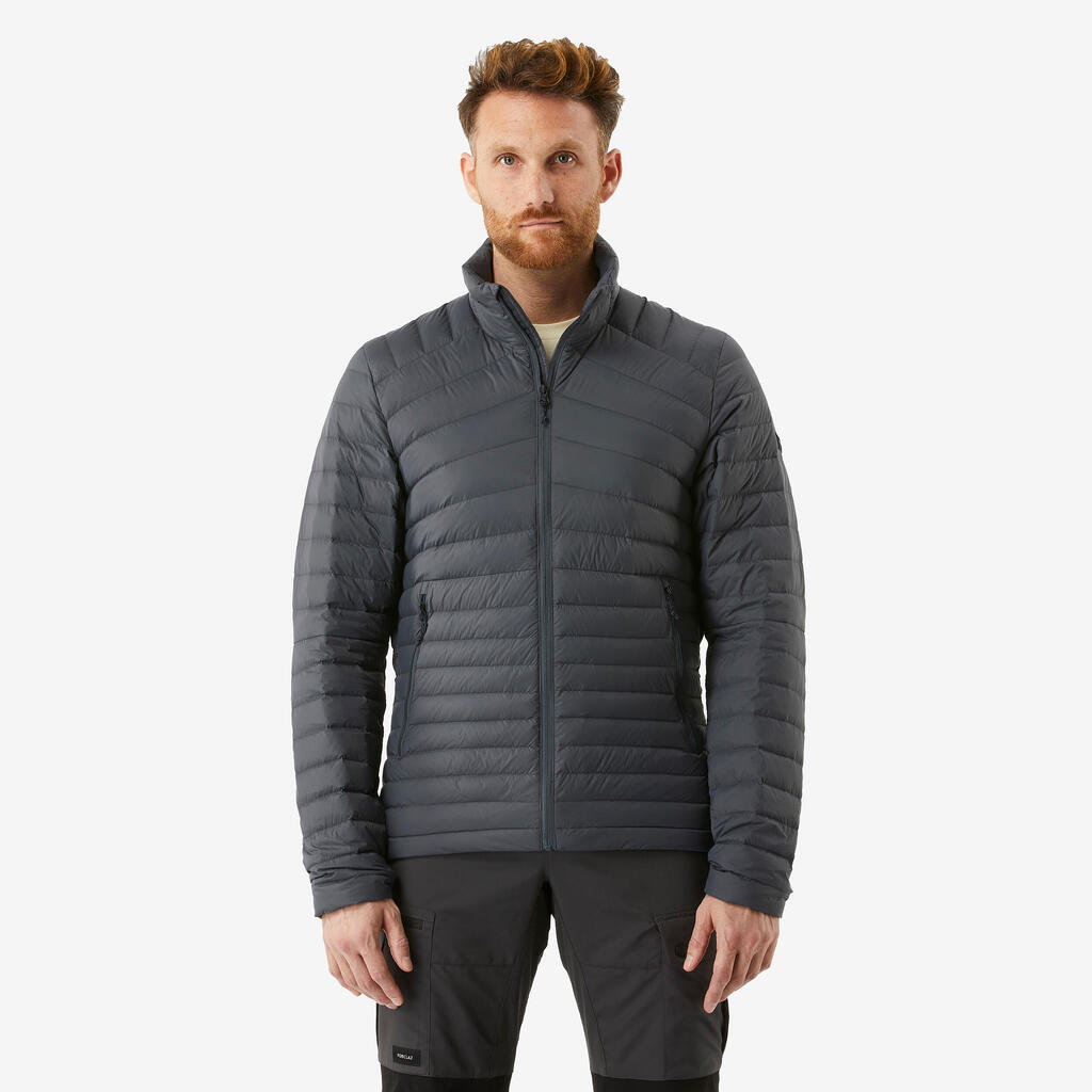 Jakna za treking MT 100 perjana do -5 °C muška - siva